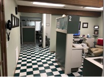 A dental office hallway before remodel.