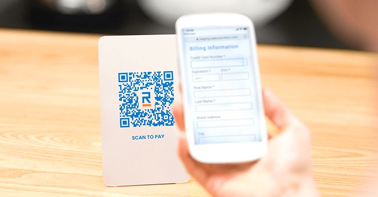 Patient scanning a QR code to enter payment information